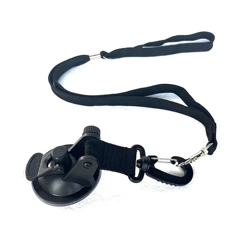 Pet bathing restraint system with suction cups and handcuff-style ties in black and blue colour options