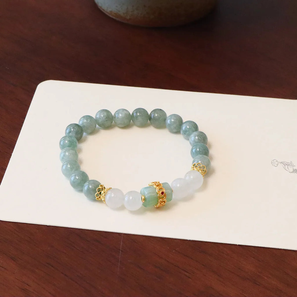 Women's jade safety buckle bracelet with geometric beads and traditional peace buckle clasp.