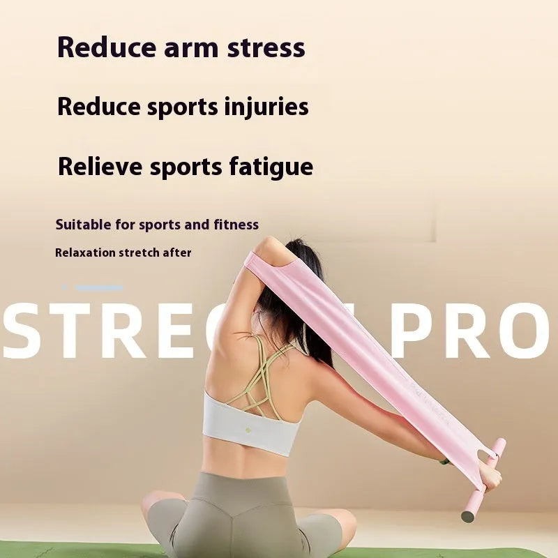 Grey or pink yoga stretching tool for shoulder, back, and hip flexibility exercises.