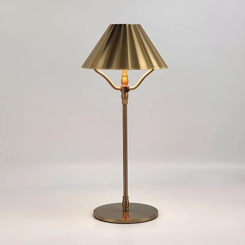 Gold alloy desk lamp with touch switch and interchangeable lampshade on a wooden desk