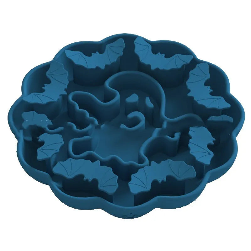 Edible silicon anti-choke slow feeding dog bowl in Halloween orange colour on floor