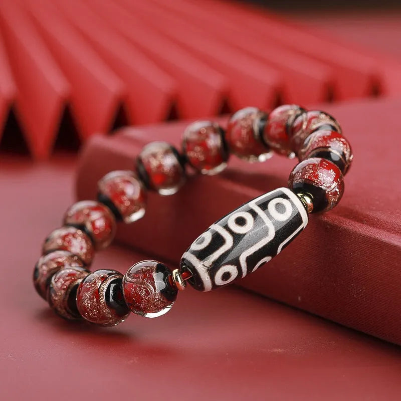 Traditional Chinese coloured glaze bracelet with year snake and lucky bead elements in ancient five-colour design
