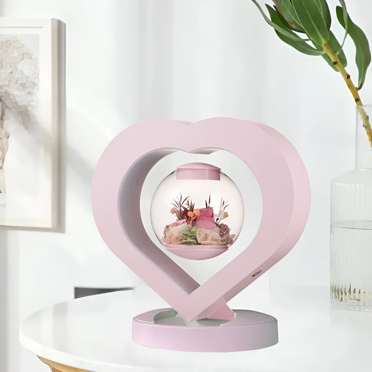 Pink preserved rose ornament with optional base and Bluetooth audio functionality for gift-giving