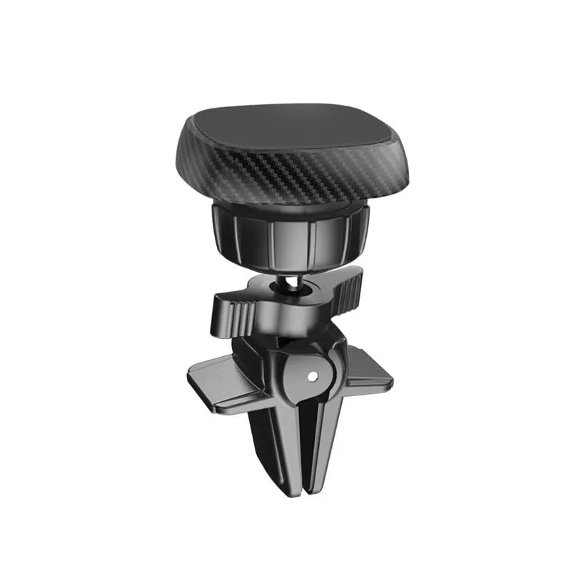 Black magnetic car phone holder attached to vehicle air vent