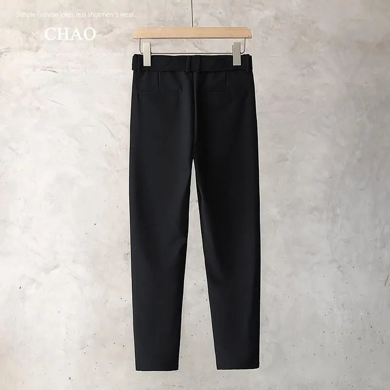 Boys slim straight wool trousers in a tapered cut with a straight leg opening.