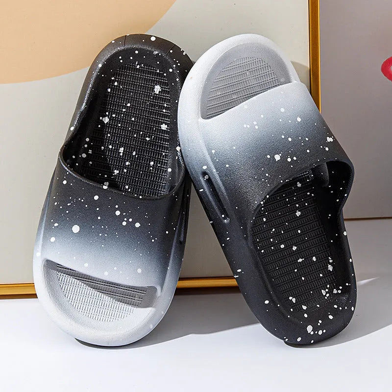 Gradient blue PVC children's slipper sandals on a white background, showing non-slip sole.