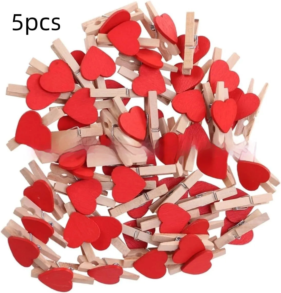 A set of five handmade wooden heart-shaped clips in assorted colours on a plain background.