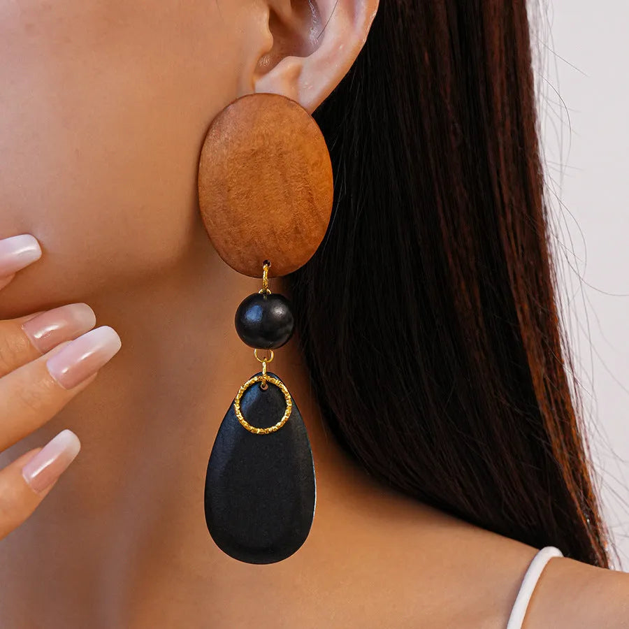 Retro wooden ellipse earrings handmade in brown-black colour with silver needle detailing