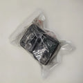 Black plastic seat belt buckle holder clip for car seat belt organisation