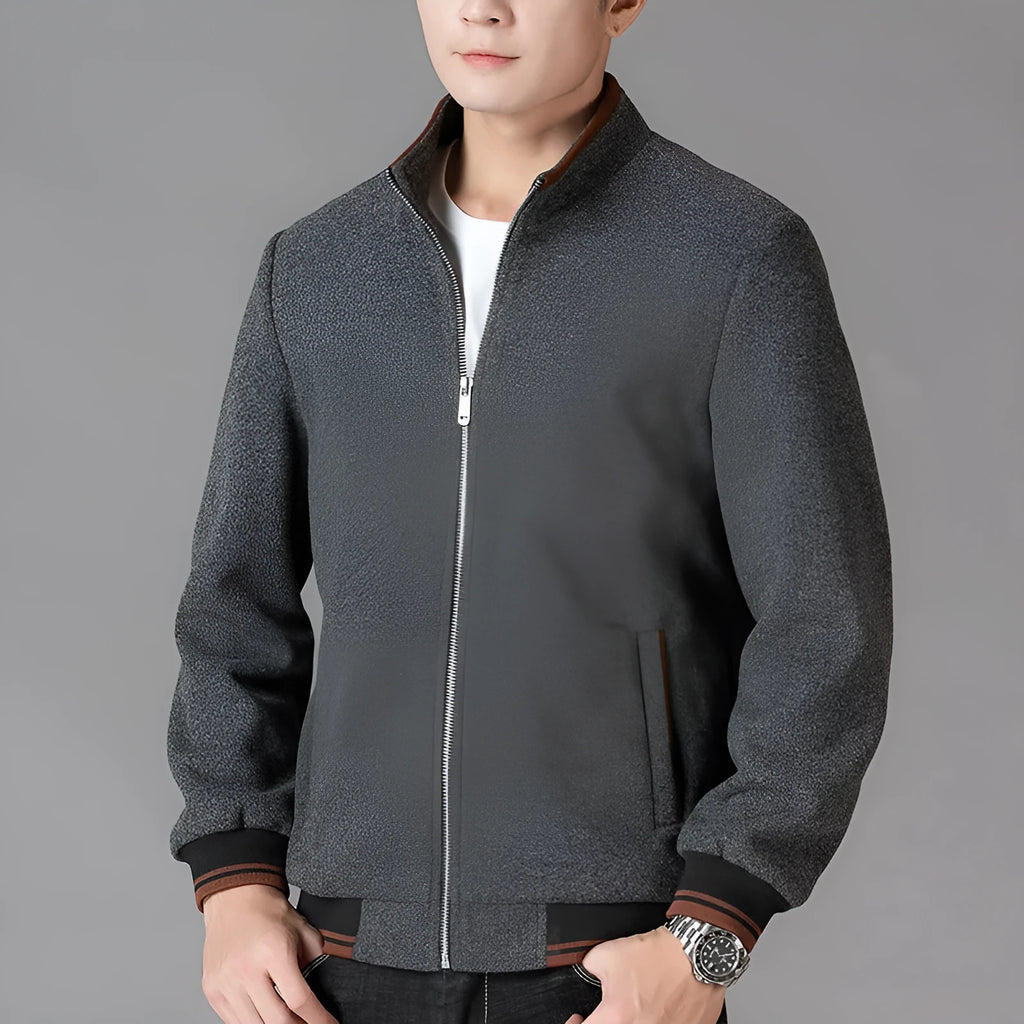 Men's grey sport-style fleece jacket with long sleeves on a hanger.