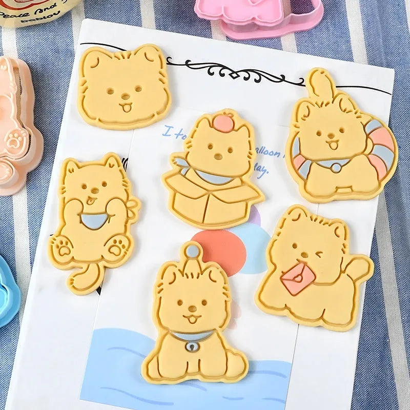 Three-dimensional plastic biscuit mould for making puppy-themed cookies with seven dog cartoon designs
