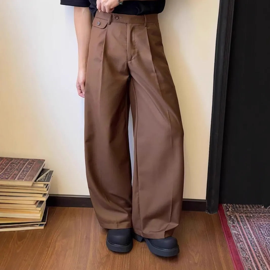 Men's brown straight-leg wide drape casual trousers laid flat