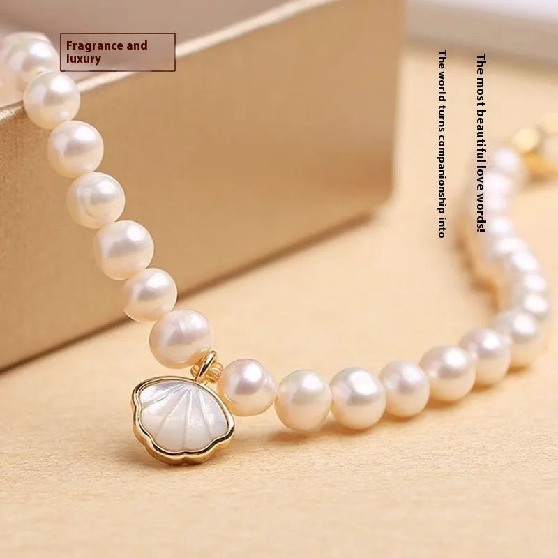 Women's freshwater pearl bracelet with fan-shaped design and alloy clasp, 16cm long.