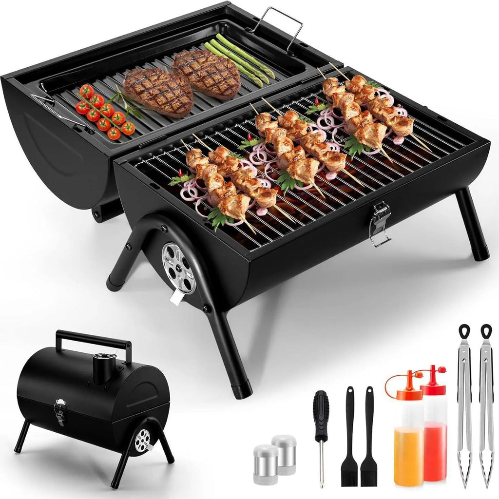 Small folding desktop charcoal barbecue grill with smoking device on a table.