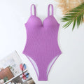 Women's one-piece swimsuit with a sunken stripe pattern in various colours.