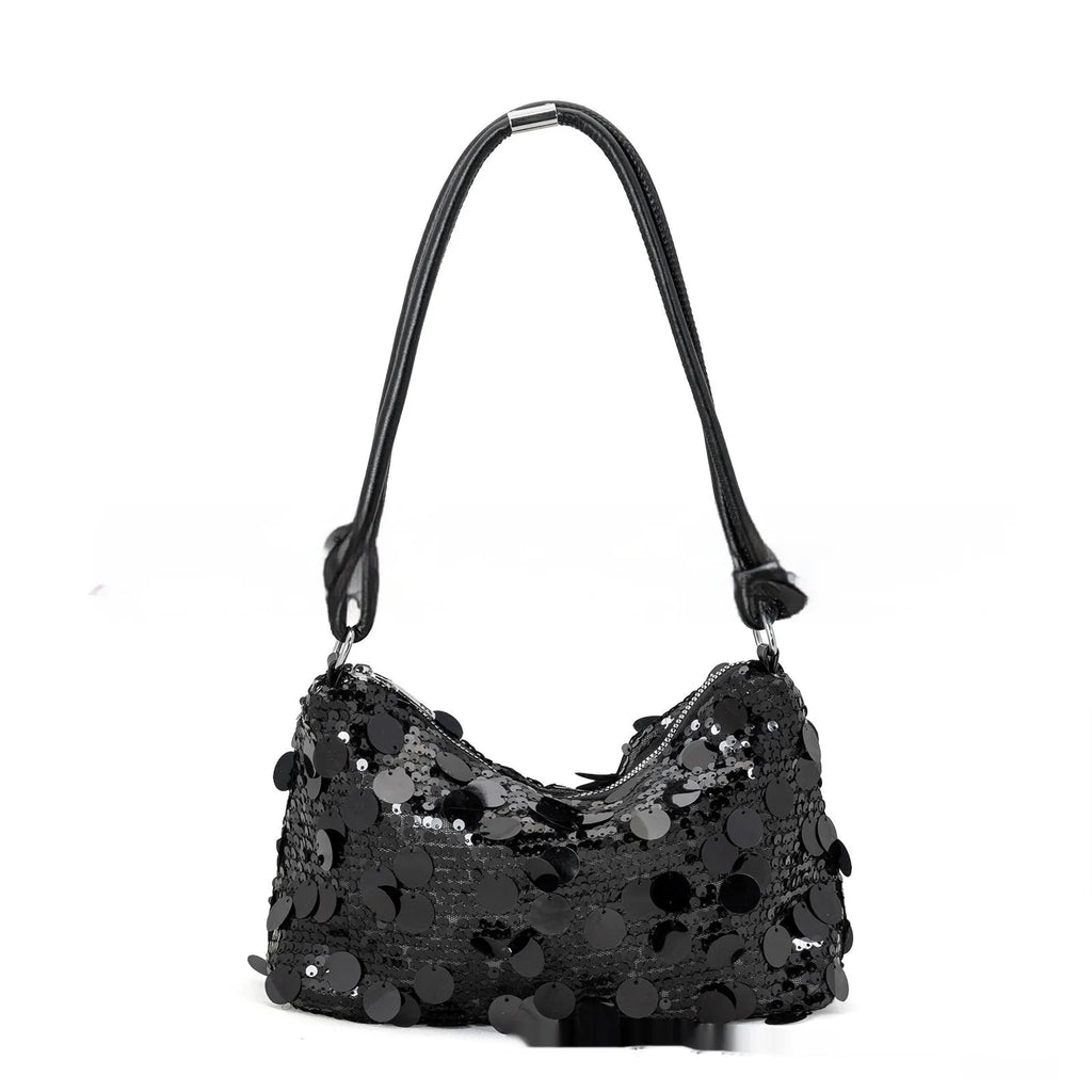 Soft polyester women's crossbody bag in black colour showing sandwich pocket design and single shoulder strap