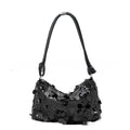 Soft polyester women's crossbody bag in black colour showing sandwich pocket design and single shoulder strap