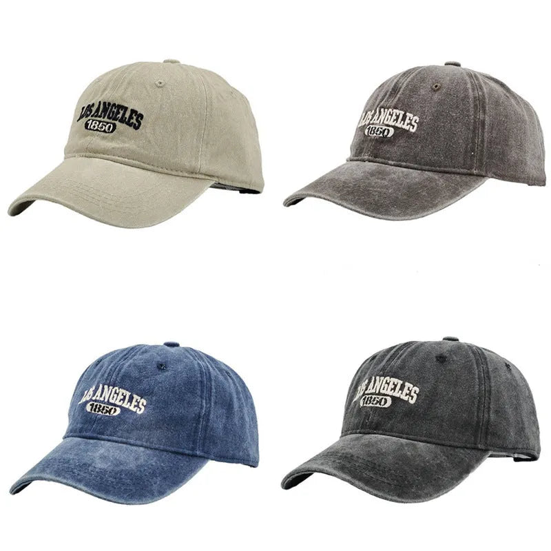 Personalised washed distressed embroidered peaked cap in acrylic fabric on adjustable head model.