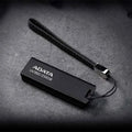 Black USB 3.2 flash drive with car mount clip showing waterproof plastic casing
