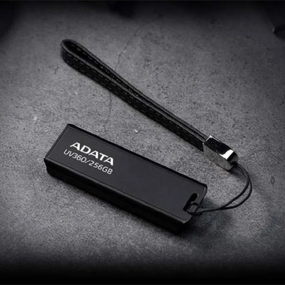 Black USB 3.2 flash drive with car mount clip showing waterproof plastic casing