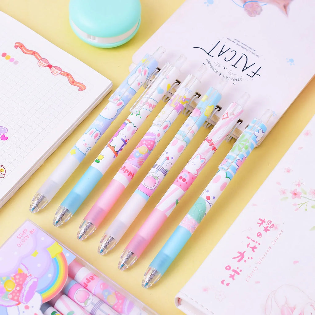 Six plastic ballpoint pens with cartoon bunny design showing 0.5mm tips and neutral black ink