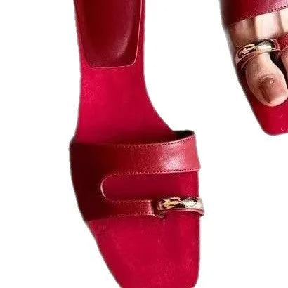 Leather upper outdoor slipper with square scaffolding toe and rubber sole in black, red, silver, and white.