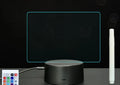 Black 3D acrylic LED night light and message board with stylus on a desktop