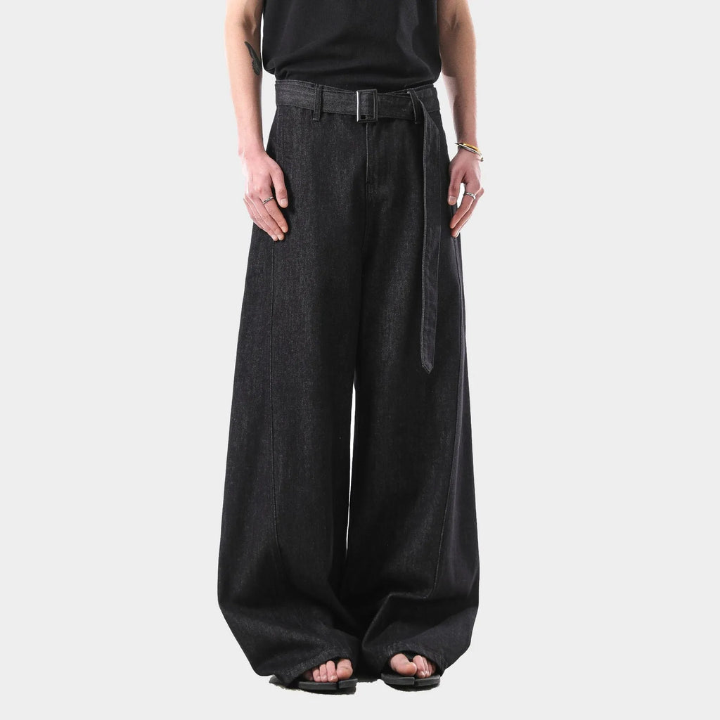 Black high waist straight leg jeans on a neutral background