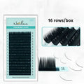 Black artificial fibre false eyelashes showing different length and density options on a clear tray
