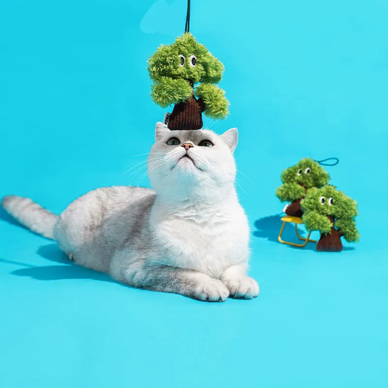 Felt pine tree shaped cat toy with cotton rope hanger and cat mint scent.