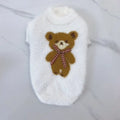 Wool pet sweater with bow tie and bear design in purple, pink, green-blue, or white, sizes XS to XXL.