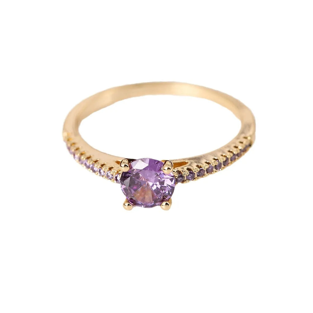 Geometric hexagon zircon fashion ring in electroplated copper on a hand, showing gold and gun black colour options.