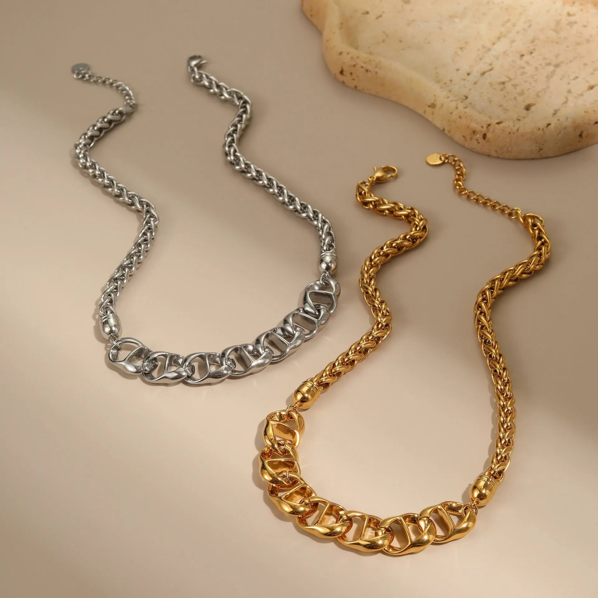 Stainless steel geometric necklace with 18K gold plating in gold and steel colour options