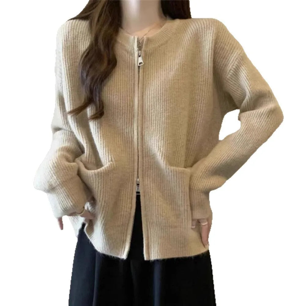 Beige soft viscose women's sweater coat cardigan with long sleeves on a hanger.