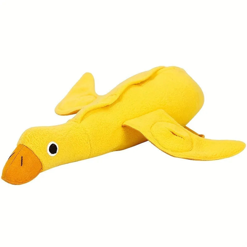 Yellow teddy duck dog toy with food leak openings and squeaker for training and chewing