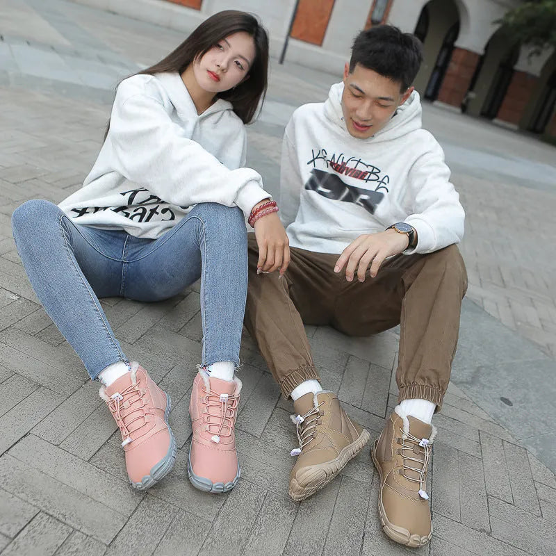 Outdoor snow boots in black, khaki, or pink with a lace-up front and rubber sole.