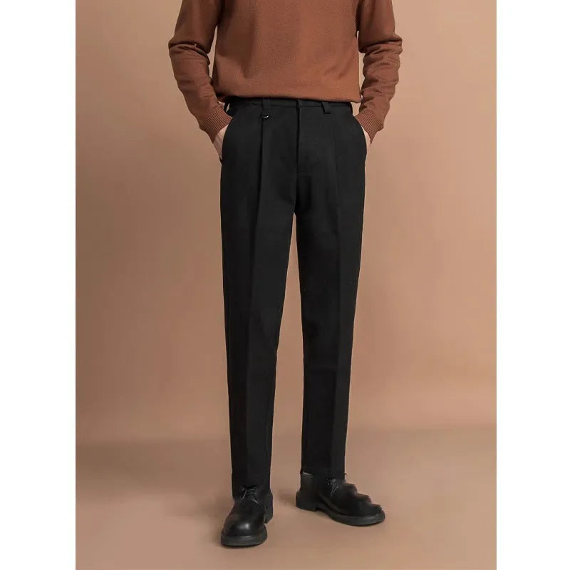 Men's straight leg polyester trousers in black, shown laid flat to display the cut and drape.