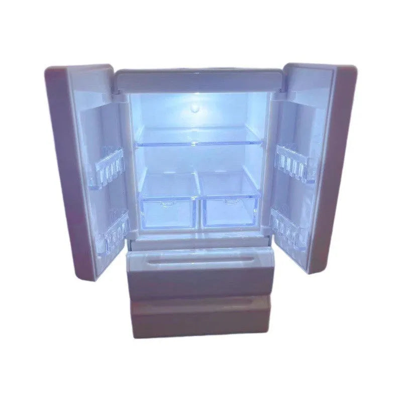 White plastic miniature candy toy model with illuminated light function, shown on a desk.