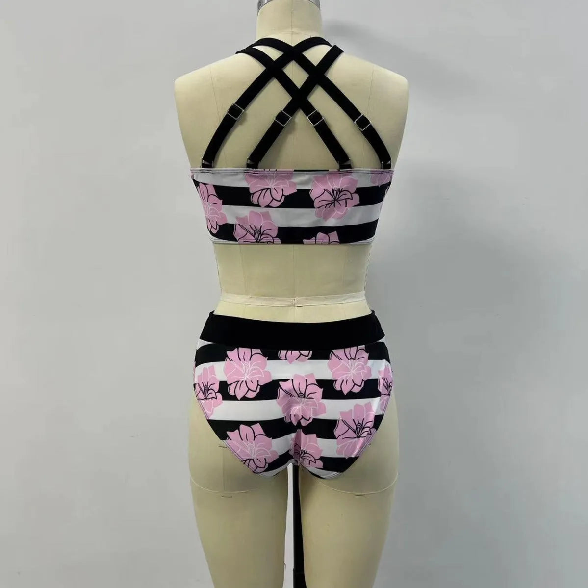 Black printed women's bikini swimsuit with belly covered slimming design.