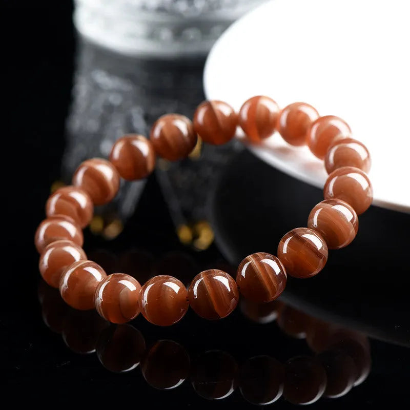 Natural Old Mine Rhodochrosite round bead bracelet with Ruyi element, choice of 6mm or 8mm beads.
