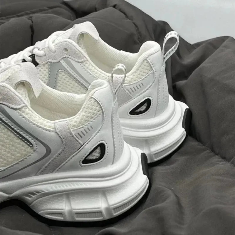 Beige mesh sports shoes with wedge heel and lace-up front on rubber sole