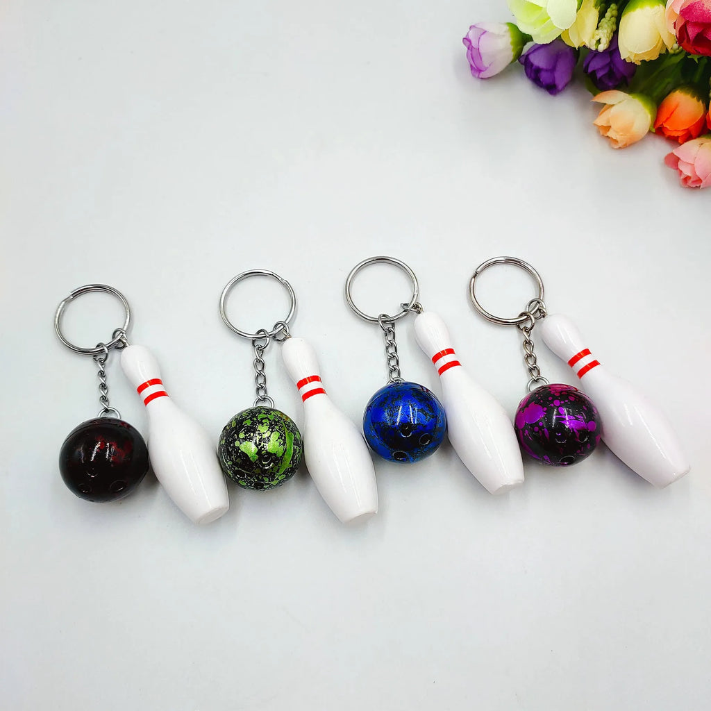 Mini simulation bowling ball keychain pendant with metal clip in blue, red, purple, and green colours