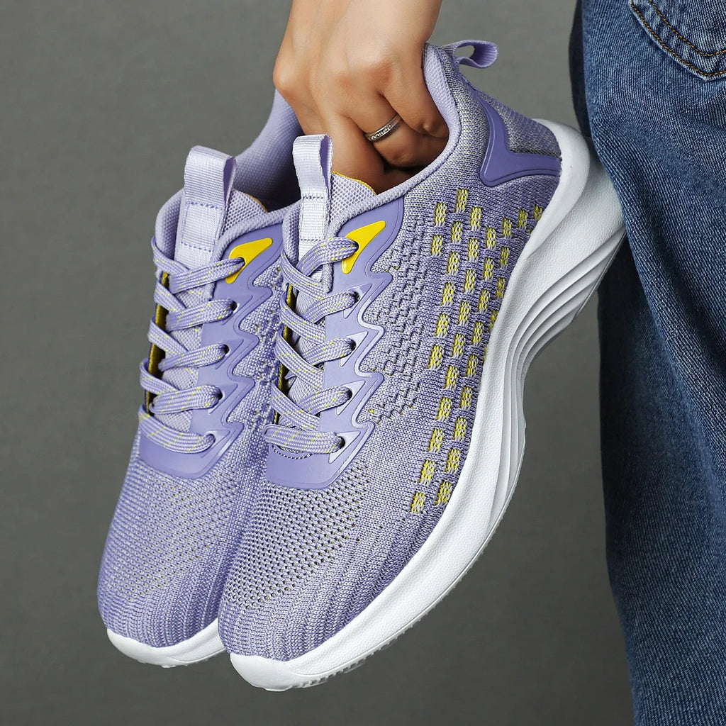 Women's Flyknit running shoes with striped pattern, mesh lining, and wedge heel in Lavender Purple or Royal Blue