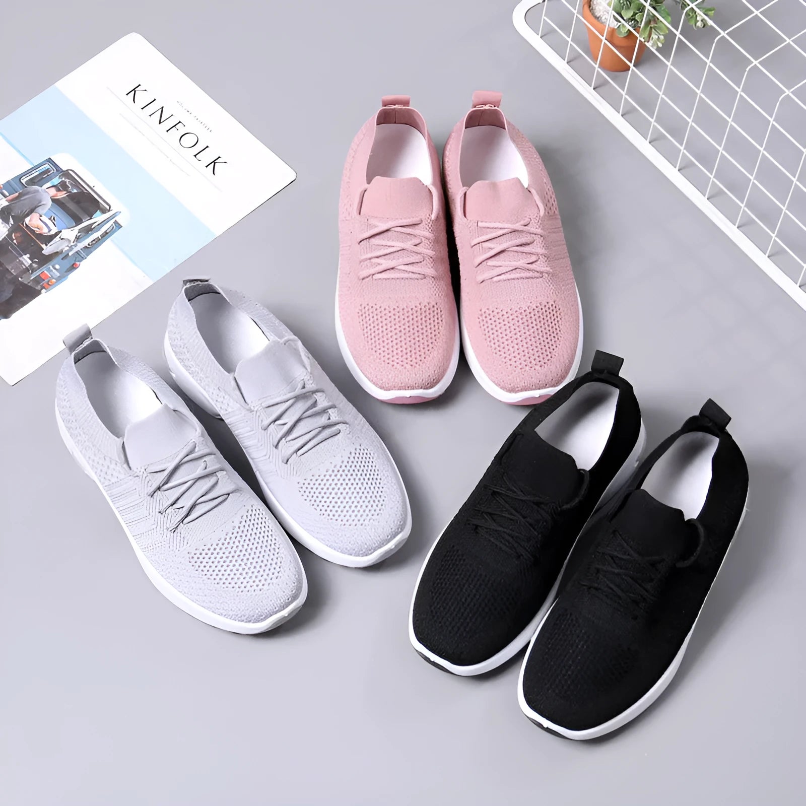 Women's solid colour mesh sneaker with round toe and white PVC sole on a grey background