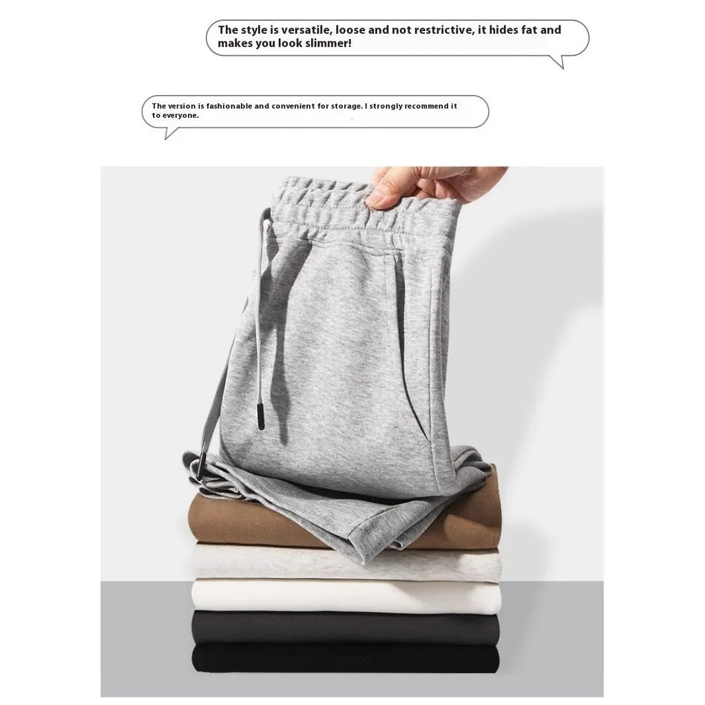 Cotton straight leg sports shorts in light grey colour showing micro-elastic fabric and fifth pants length