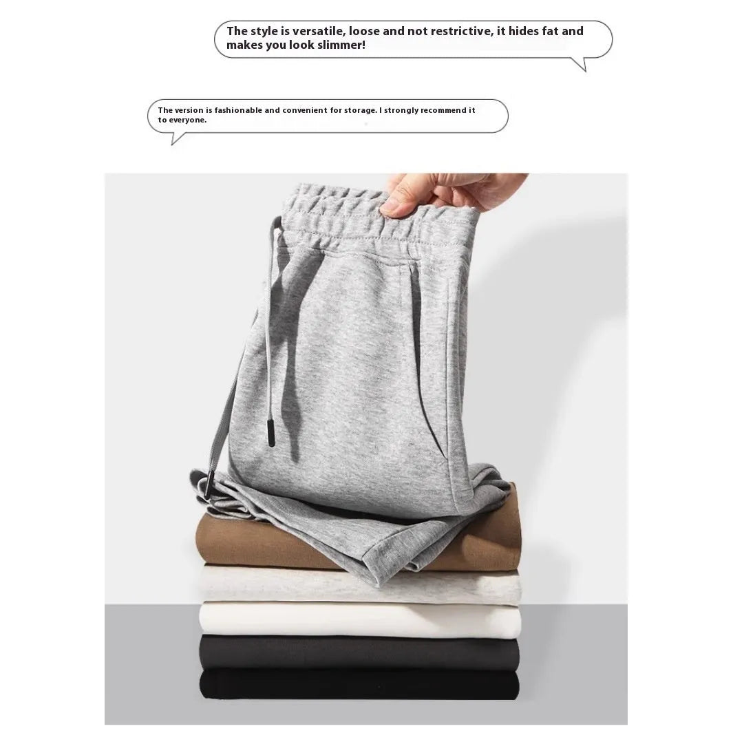 Cotton straight leg sports shorts in light grey colour showing micro-elastic fabric and fifth pants length