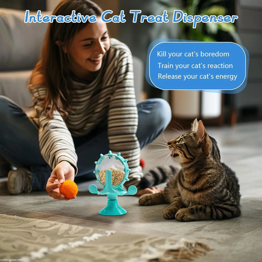 Blue interactive pet puzzle feeder toy with spinner and strong suction cup base.