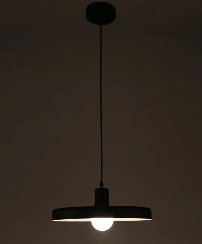 Aluminium alloy bar chandelier light fixture in black finish, shown in a restaurant setting.