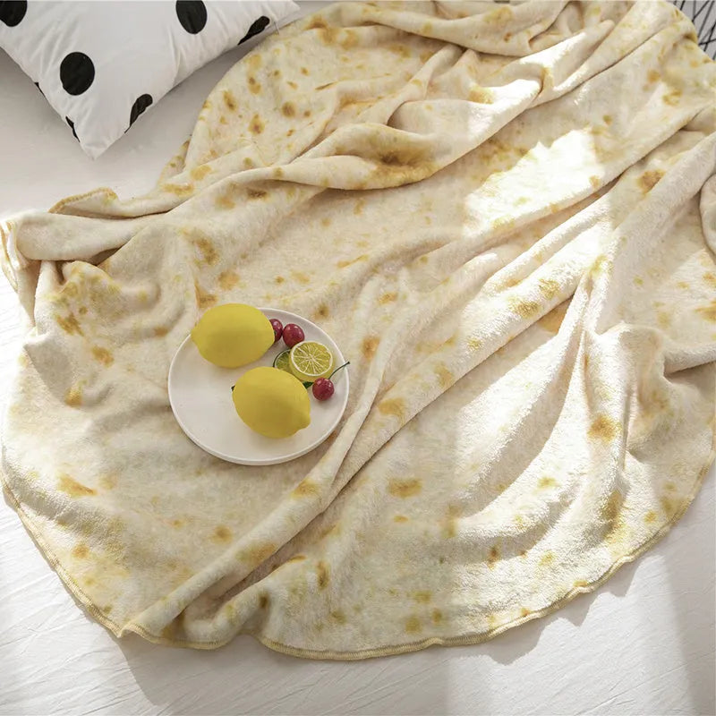 Round coral fleece burrito blanket with food print, shown wrapped.