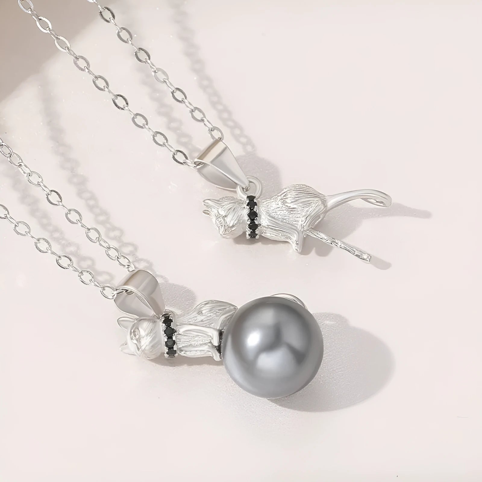 925 sterling silver cat pendant necklace on a chain, showing elegant feline design.